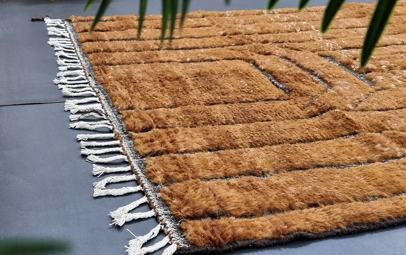 Hand-knotted ivory wool Beni Ourain rug close-up showing plush texture