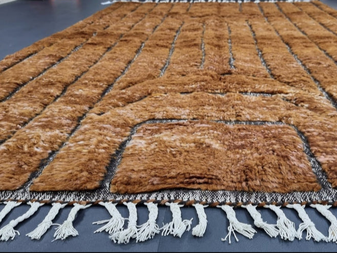 Detail of accent grid pattern on custom handmade wool rug