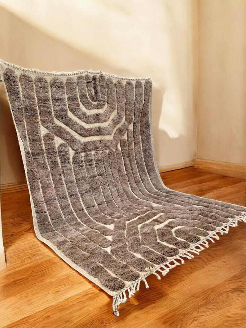 Custom Moroccan rug runner with cream base and black geometric lattice Berber Moroccan rug design, handwoven from wool, featuring fringed edges for a bold Moroccan rug area.