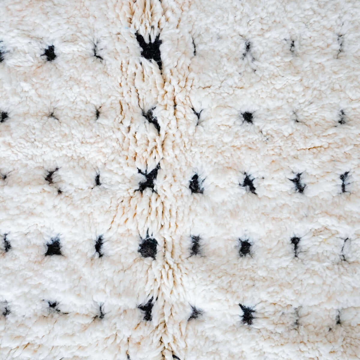 Detailed close-up of Atlasknot rug showing dense wool texture and intricate Berber knot motifs