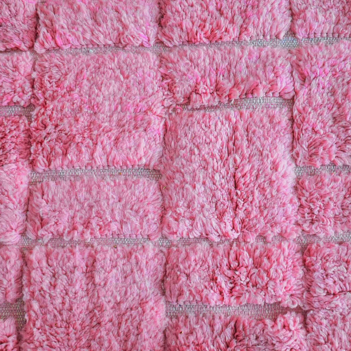 Detailed close-up of Fleurber rug showing soft wool texture and intricate floral motifs