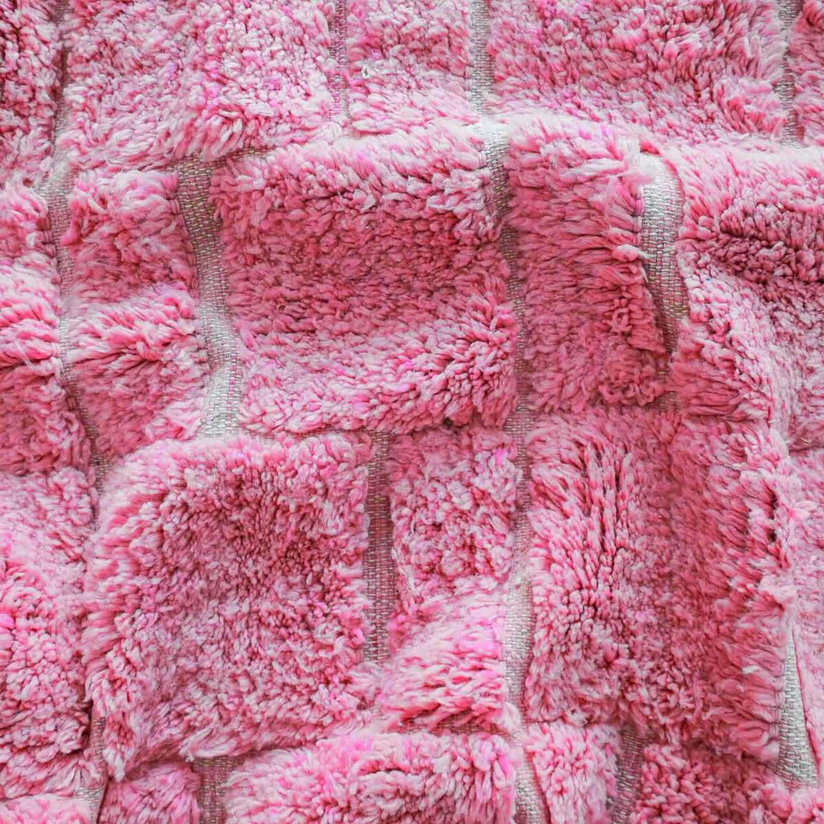 Detailed close-up of Fleurber rug showing soft wool texture and intricate floral motifs
