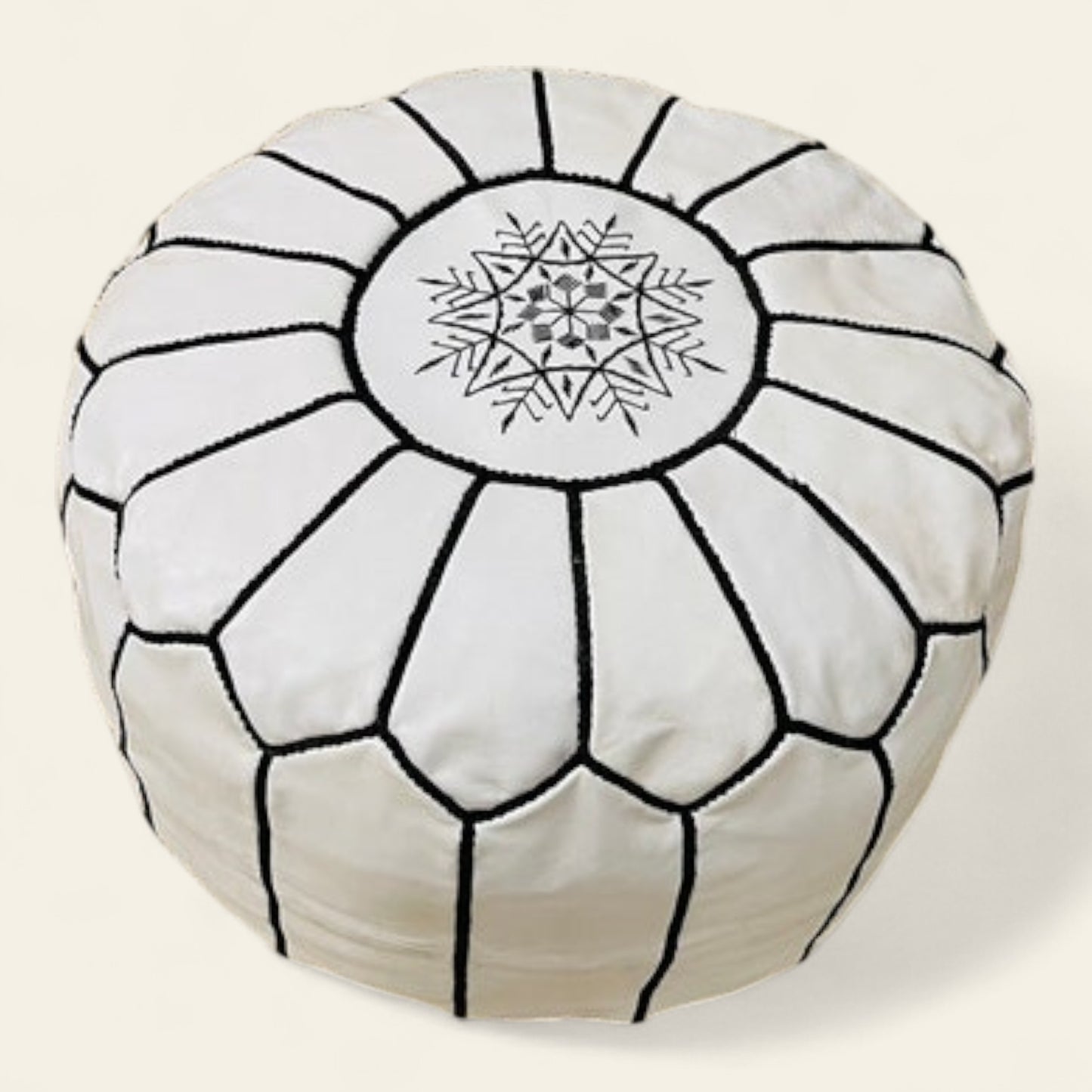 handmade white Moroccan leather pouf, crafted by skilled artisans in Morocco