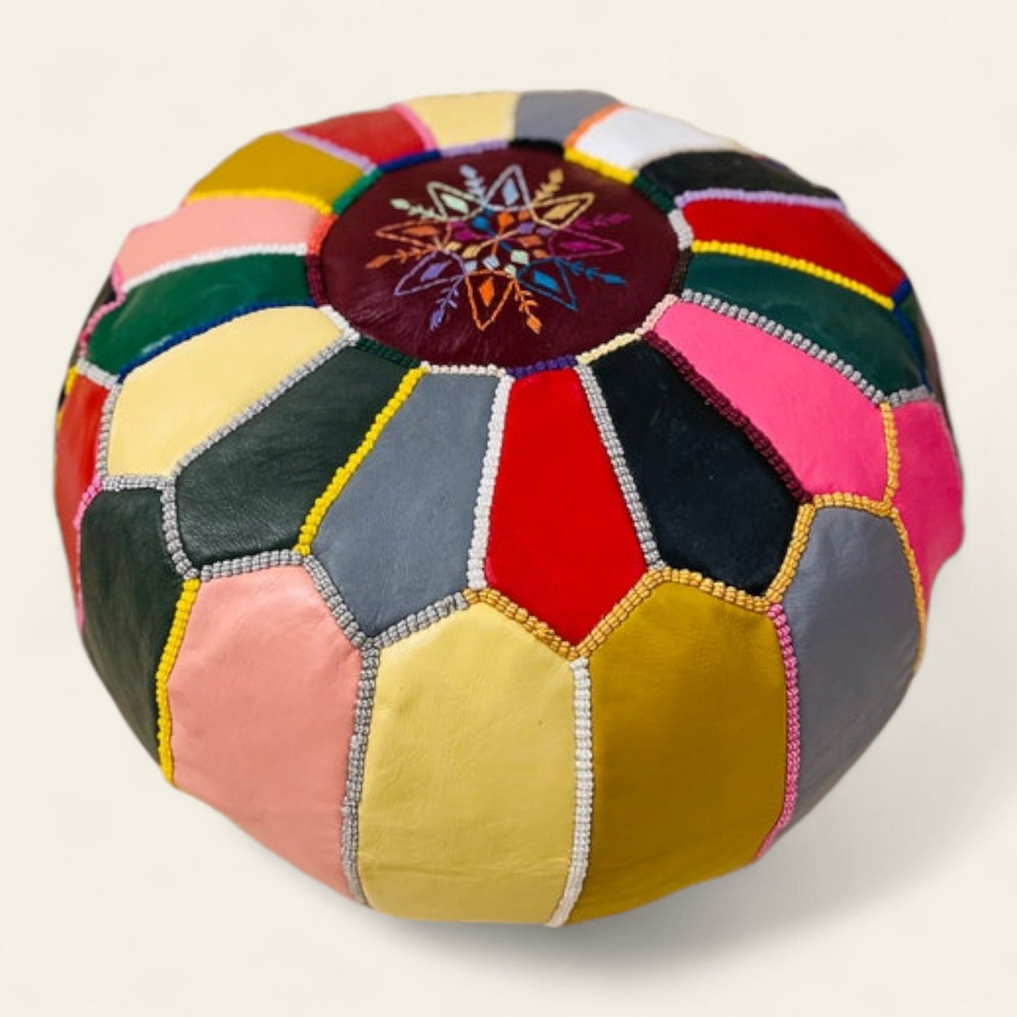 multicolor Moroccan leather pouf—handcrafted by skilled artisans in Morocco