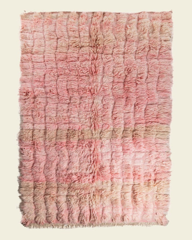 Custom Moroccan rug runner with pink and beige textured Berber Moroccan rug design, handwoven from wool, featuring fringed edges for a cozy Moroccan rug area.