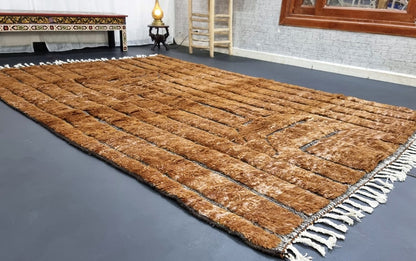 Custom Moroccan rug runner with brown base and gray striped Berber Moroccan rug design, handwoven from wool, featuring fringed edges for a chic Moroccan rug area.