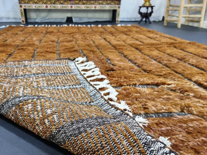 Detail of accent grid pattern on custom handmade wool rug