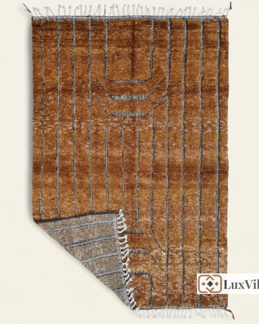 Custom Moroccan rug runner with brown base and gray striped Berber Moroccan rug design, handwoven from wool, featuring fringed edges for a chic Moroccan rug area.