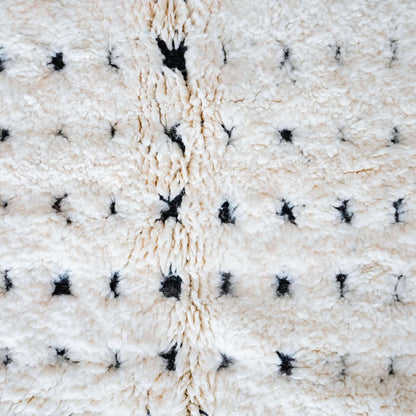 Detailed close-up of Atlasknot rug showing dense wool texture and intricate Berber knot motifs