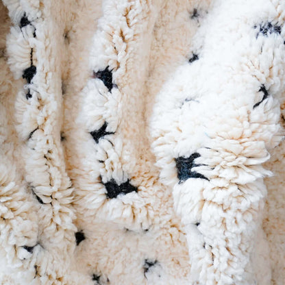 Detailed close-up of Atlasknot rug showing dense wool texture and intricate Berber knot motifs