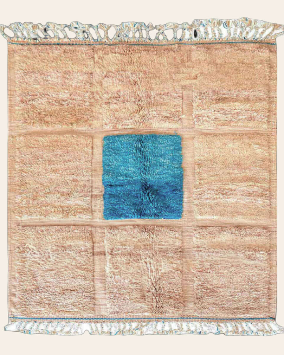 SaharaBeige hand-knotted Moroccan wool rug in soft beige tones with subtle tribal patterns