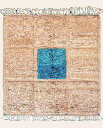 SaharaBeige hand-knotted Moroccan wool rug in soft beige tones with subtle tribal patterns