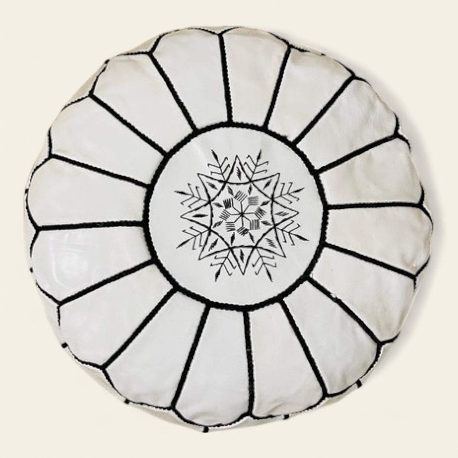 handmade white Moroccan leather pouf, crafted by skilled artisans in Morocco
