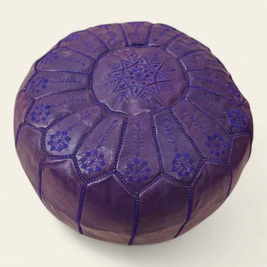 handmade purple Moroccan leather pouf, crafted by skilled artisans in Morocco